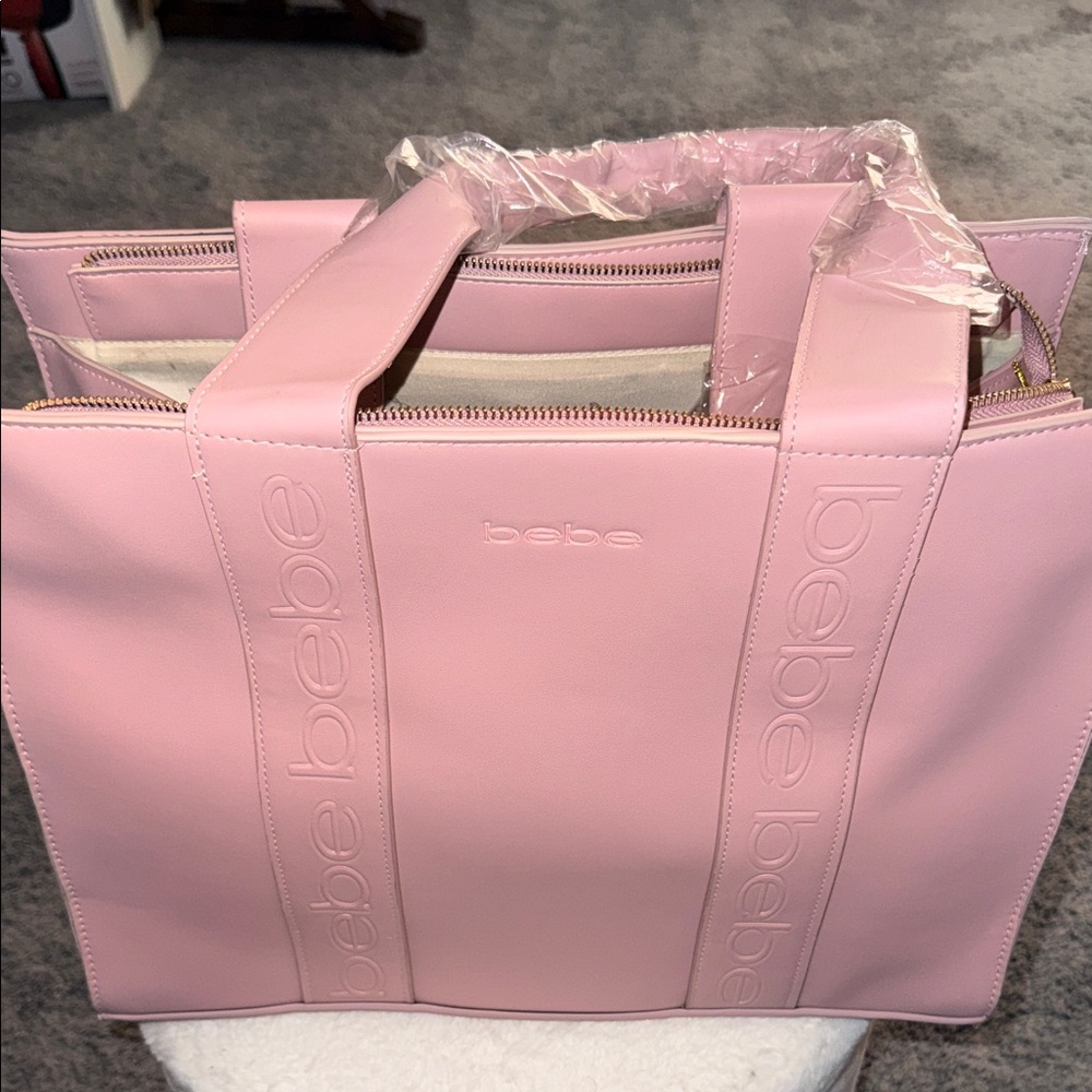 bebe Light Pink Structured Tote with Logo-Embossed Straps